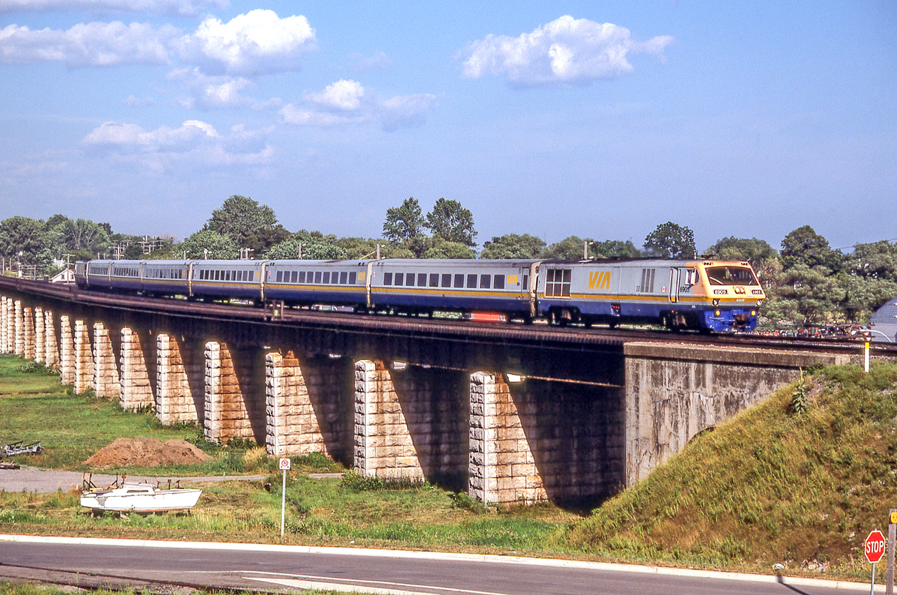 VIA 6905 is crossing the Ganaraska River in Port Hope, Ontario on August 8, 1985.