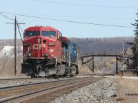 One of my favourite spots on the Galt Sub for shooting trains is Campbellville as it is relatively scenic. Pictured is a light power move consisting of CP 9643 and CEFX 1042. I believe this pair was used to help another train as I recall it came off a westbound autorack train (possibly CP 147 at time). A keen eye will notice some younger rail photographers to the right.