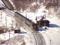 Back when I was young(er) and more adventurous, I would wander up to the lookout at Dundas Peak and wait for some trains to record with my old Pentax 1000. I'd not do this trek any more; too damn lazy; but these days the area is pretty much off limits and even hiking to the Peak requires paid parking and I think controlled hours.
In this morning view we see CN 3105 east; I have distorted this image, unfortunately, shooting full out 210 MM with a cheapo lens but at least caught the memories.
It is a long time back but I know I made the hike because that is my car parked at the Dundas station.