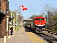 It certainly isn't very often I take a liking to Amtrak equipment. However, their #113 has been painted into a very attractive new scheme, and for those who do not see Amtrak very often this image will prove someone was on the ball in  coming up with such a striking design.
The train is shown slowing up at St. Kitts station for one passenger to board for Toronto. The flag is a nice touch to the scene.
Amtrak's "Maple Leaf" runs between New York City and Toronto daily.