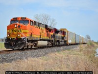 With a heads up from several guys further east on the Windsor Subdivision I was able to catch today's CPKC #137 as it approaches Banwell Road crossing, just east of Walkerville, on the CPKC Windsor Sub.  Today's power is BNSF ES44AC #5727 and KCS SD70ACe #4142 somewhat mimicking yesterday's 137 which had CSX #7115 and a KCS unit.  Nice seeing some of foreign power leading again westbound on the Windsor Sub.