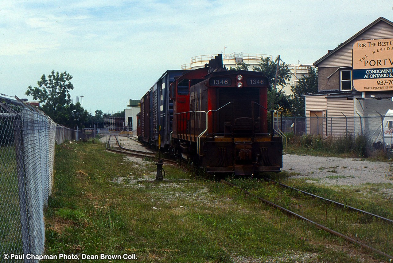 CN 549 with CN SW1200RS 1346 working at GM Ontario Street plant.