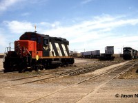 CN GP9RM 4126, along with Norfolk Southern C40-9W’s 8914 and 8931 are pictured at Dain City, which was situated near Welland, Ontario. Both NS GE’s are only a few months old having been built in February 1996 and they also have NW caboose 555019 with them. Looking back, this was one area I wish I had more photos of, as the small intermodal yard eventually closed in 1998. Today, this area is still operated by GIO Rail, which services Verbio and SLM Recycling from the Canal Spur.