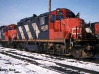 CN GP9RM 4138 along with 4112 and 4102 are pictured waiting for their next assignments at the MacMillan Yard diesel shop in Vaughan, Ontario. In the future, 4138 would be re-lettered AR Illinois for a starring role in the 1997 Canadian comedy “The Wrong Guy” that was filmed primarily around Toronto and area. Almost three decades later and the unit still retains it’s now fading AR Illinois logo on the nose.