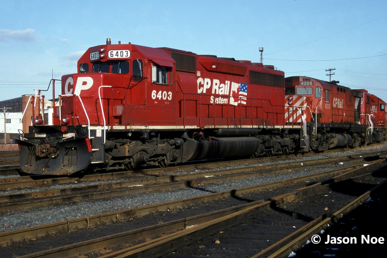 CP SD40A 6403, C-424 4208 and GP38-2 3072 are pictured waiting to depart Aberdeen Yard in Hamilton, Ontario across from the station building. CP 6403 was originally built as Kansas City Southern SD40 625 in June 1970. It was eventually acquired by SOO Line and became SOO Line 6403.