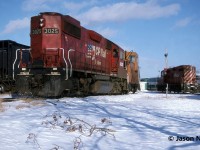 During a Saturday evening, CP GP38-2 3025 and caboose 434551 along with GP9u 8235 wait for their next week’s assignments at Guelph Jct in Campbellville, Ontario. On this day, CP caboose 434669 was also in the yard at the junction. 
