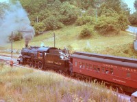 locomotive 1057 is a former CP Rail Class D-10h 4-6-0 steam engine built in 1912.During the 70's it ran excursions out of Toronto, Ottawa and Guelph. I believe it is currently preserved at the South Simcoe Railway in Tottenham Ontario. Sorry for the less than ideal quality of the picture but it is a scan from a slide. I hope its rarity allows it to be posted.