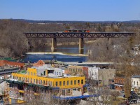 During the brief time of 401/402 operating Sarnia - Garnet, a very shot 402 scoots over the Grand River at Paris.