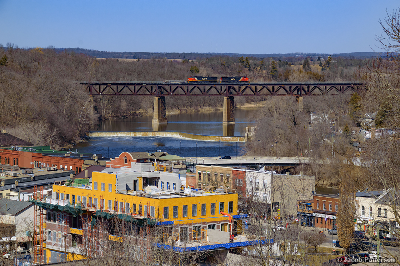 During the brief time of 401/402 operating Sarnia - Garnet, a very shot 402 scoots over the Grand River at Paris.