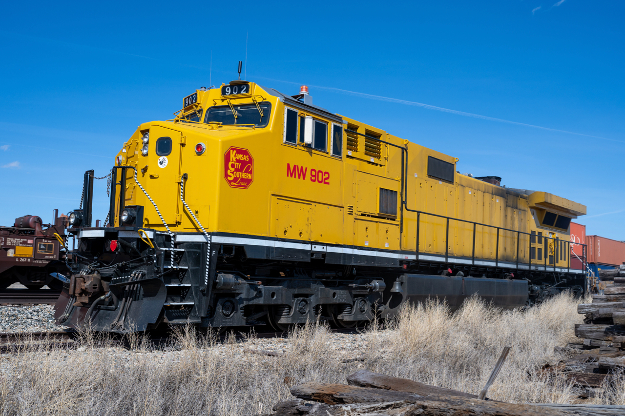 KCS MW 902 is one of two exBNSF C44-9Ws converted to MW service by KCS after a group of 20 exBNSF units was acquired from GECX. (not to be confused with the other 50 C44-9Ws acquired directly from BNSF)  Most if not all the other C44-9Ws have been sold or are off the roster, making the two in MW service qualify as "oddballs" on an otherwise all AC GE roster.  It sure is weird to think of a 4400hp 6-axle GE relegated to MW service.