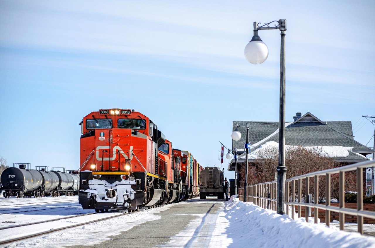 Train 403 fills up with diesel fuel before departing Mont-Joli for Joffre (Charny, QC), the locomotive, an early batch of SD70m-2, is nearing 20 years of age. Hard to believe they have been around for that long already... Especially with such clean paint.