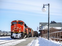 Train 403 fills up with diesel fuel before departing Mont-Joli for Joffre (Charny, QC), the locomotive, an early batch of SD70m-2, is nearing 20 years of age. Hard to believe they have been around for that long already... Especially with such clean paint.