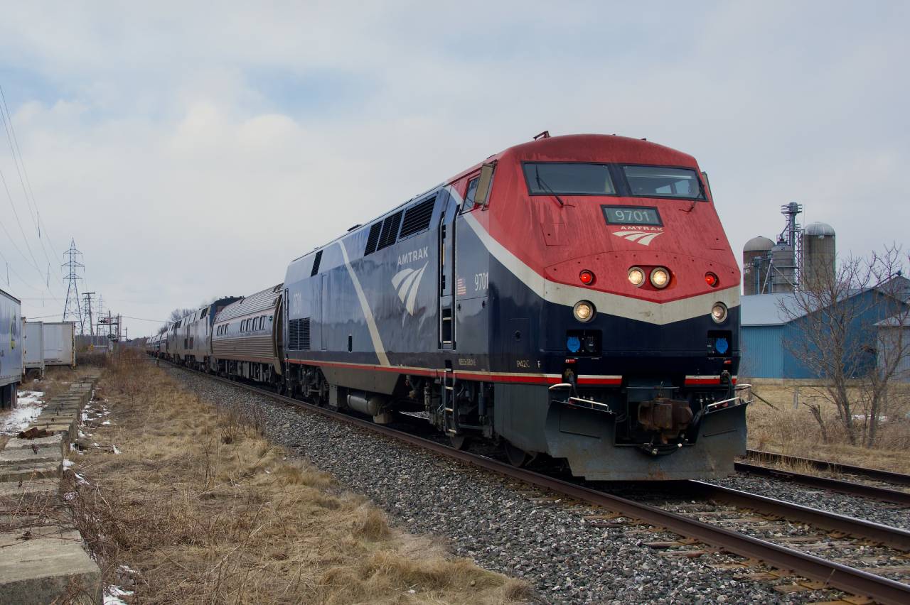 With rescue power ahead of the regular train, Amtrak 694 (Amtrak 68 once it reaches CPKC rails) passes the L'Acadie siding in Saint-Jean-sur-Richelieu this past Saturday afternoon. Both southbound and northbound Adirondacks had been cancelled the previous day. As far as I know, this is the first time a 9700-series P42C made its way to Canada.
