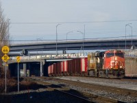 Ballast train CN 491 is eastbound after a recrew and refueling, on its way to the Cyrille pit for a refill.