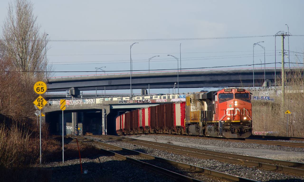 Ballast train CN 491 is eastbound after a recrew and refueling, on its way to the Cyrille pit for a refill.