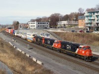 CN 120 is heading east with two SD75IACCs up front and an ES44AC third (CN 8308, CN 8315 & CN 2819).