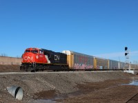 Westbound CN 8343 (Ex-CN 5744) with all auto racks through Derry over the "construction switch" installed on March 23 2026. The left hand #20 turnout will provide access to and from the future south track between Ash and Derry.

