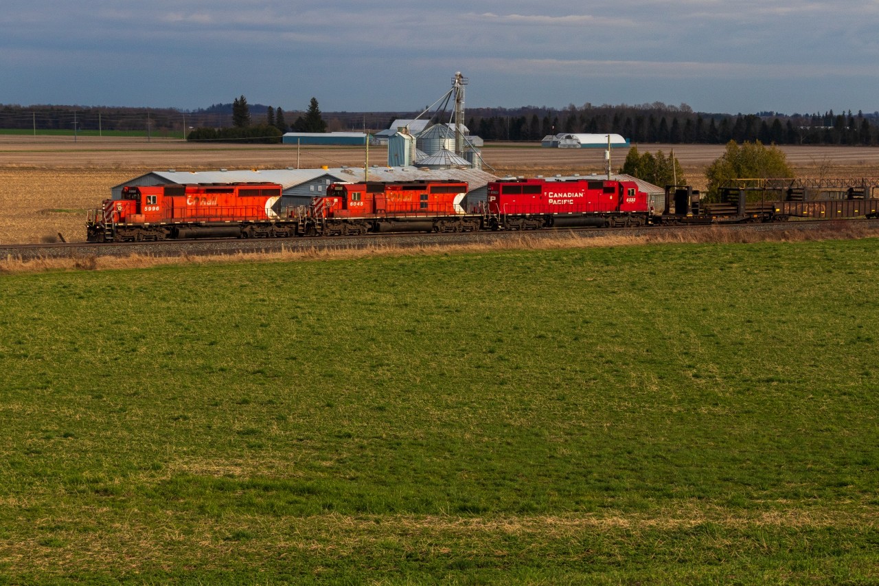 Just over a year ago, a northbound CWR catches the tail end of sun on an otherwise cloudy day with CP 5996, CP 6045, and CP 6232 leading. The multimark is probably the most iconic logo from the diesel era of the Canadian Pacific Railway. Once displayed on hundreds of locomotives, the classic logo & accompanying "action red" paint colour are down to 6 active locomotives in 2026 by my count. With SD40-2 refurbs coming in the new Keith Creel colours, this number is expected to dwindle further as time goes on. A pair in 2025 was incredible, but the question must be asked: will Ontario see a multimark duo ever again? Chances are slim but you never know...