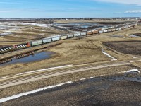 CN L 52151 18 spots Morinville Pioneer with CN 5350 and CN 5305.  The train departed Edmonton with 165 cars and carry on up the old NAR mainline to Westlock with 67 for WTI.  