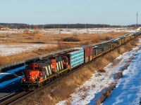 CN L551 heads north (timetable east) up the Halton at restricting speeds following a 394 in front of them. Power is CN 4131 & CN 4115, matching zebra GP9RMs. CN 4115 recently returned to the Toronto power pool after spending the better part of the last decade in Montreal. As far as CN locals go, I don't think you can top a duo like this in 2026. Both units are approaching 70 years old, a wild sight for a class 1 railway. 