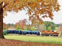 One of those locations I’ve always liked photographing over the years in the fall. Unfortunately sunny days don’t work for this angle so often I found myself making g the trip up the Guelph Junction Railway on bright but overcast days, at least for the morning northbound trip. During 2022 GEXR operations were in need of some additional power to fill in for ailing units and freshly painted/overhauled Huron Eastern GP38 3510 was quickly rerouted to the GEXR. The four exhaust stacks give away its Mo-Pac heritage. In the autumn I’ve always liked photographing the colourful trees on the hill just north of Arkel, with the train in the distance. 