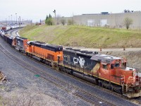 This is definitely not a location I visit often, but if I’m in the area it’s hard not to pass by just incase something interesting is on the hump sets. Not a scenic location but the sound of the hump sets working hard make up for it. Typically the sets over the past several years at the north end find a SD40 on each end sandwiching a home built slug. I was a bit surprised today to find a BLE “tunnel motor” in place of the usual slug. As for CN’s SD40U locomotives, I definitely miss seeing them out on the mainline, so definitely nice crossing paths with one today. 