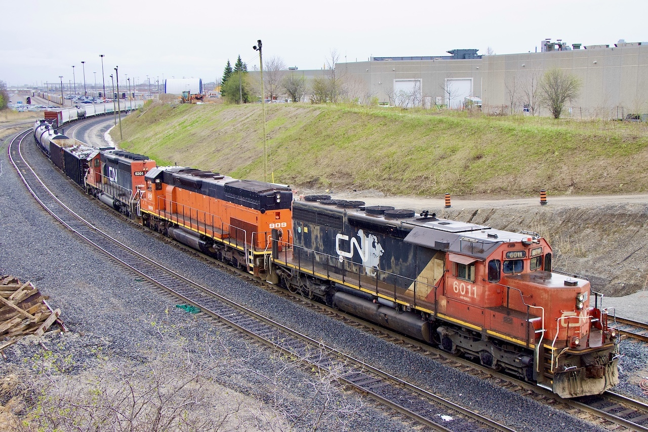 This is definitely not a location I visit often, but if I’m in the area it’s hard not to pass by just incase something interesting is on the hump sets. Not a scenic location but the sound of the hump sets working hard make up for it. Typically the sets over the past several years at the north end find a SD40 on each end sandwiching a home built slug. I was a bit surprised today to find a BLE “tunnel motor” in place of the usual slug. As for CN’s SD40U locomotives, I definitely miss seeing them out on the mainline, so definitely nice crossing paths with one today.