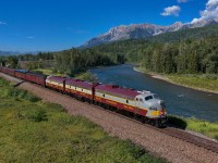 The Royal Canadian Pacific rolls along the Elk River as they approach Sparwood for a quick crew change before setting out over Crowsnest Pass. 