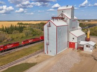 The Wilkie to Lloydminster local makes it way past the elevator at Marsden with CP 5034, CP 6258 and CP 3061 and 72 cars.  At the west end of town, the tracks curve north and head into the Battle River Valley.  