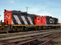 CN GP9s 4567 and 4502 are seen tied down at Allandale Yard.

<br><br><i>John Freyseng Photo, Jacob Patterson Collection Slide.</i>