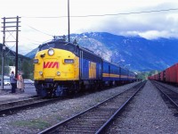 The Skeena pauses at Terrace on the Saturday of Victoria Day weekend in 1982. Now operating tri-weekly between Edmonton and Prince Rupert (departing Edmonton Sunday/Wednesday/Friday at 1700, Jasper 2215, Prince George 0640, and arriving Prince Rupert at 1900 the following day). In June 1984, a Skyline dome car would be added and the train extended to Winnipeg (alternating three days per week with the Winnipeg-Edmonton train). Note the private car on the tail end of today’s train.