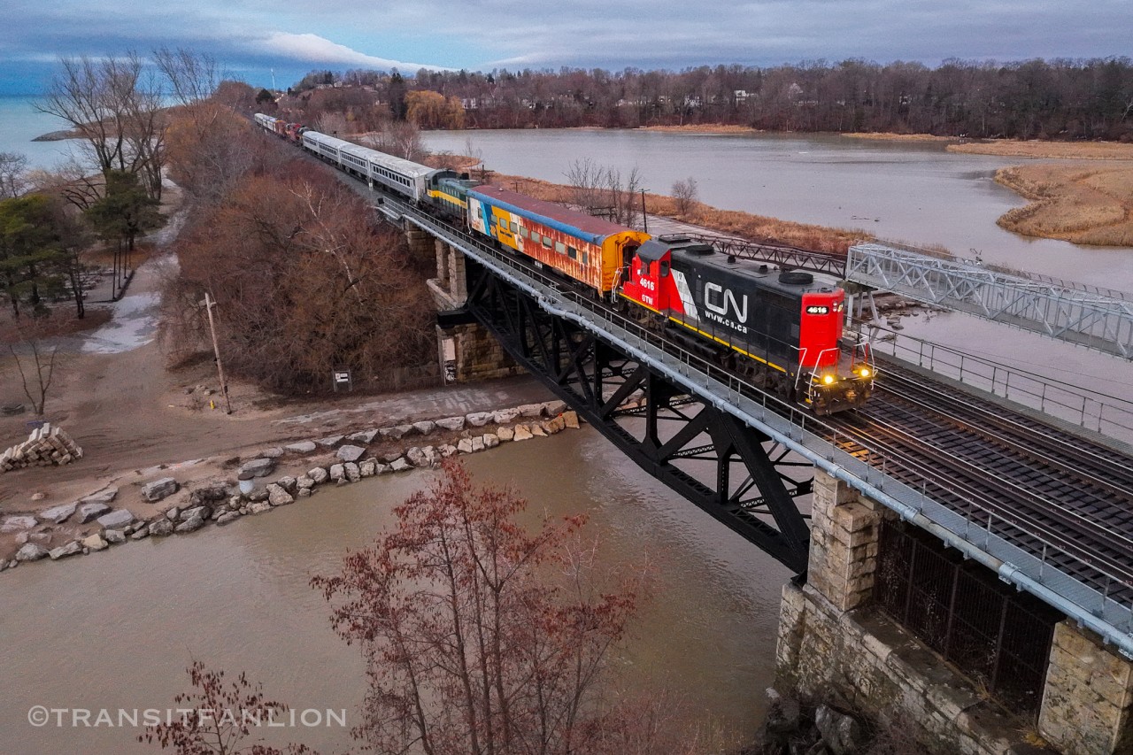 Grand Trunk Western GP9R GTW 4616 solo working on CN X54631 31, taking 15 pieces of ex- York Durham Heritage Railway now RERA's equipments from Lincolnville layover yard to Oshawa yard. Passing Mile 317 Kingston sub just about sunrise after ran around at Scarborough Jct.