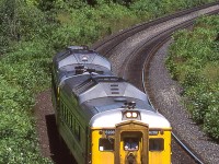 VIA 6208 is westbound in Burlington, Ontario approaching Bayview Junction, Ontario on August 11, 1987.
