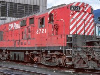 CP 8721 is outside the diesel shop in Nelson, British Columbia on August 1, 1974.