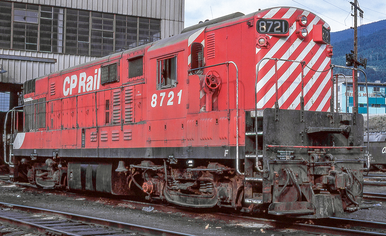 CP 8721 is outside the diesel shop in Nelson, British Columbia on August 1, 1974.
