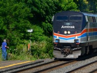 Pictured is Arnold observing something scurrying in the bushes while a train gets in the way. Stupid train. BTW, this photo is NOT copyright. Permission is granted to the globe, for this photo only, you may steal, modify, print, spam, send to government, admire or throw darts at it, decorate your computer with flowers surrounding this picture or bash your monitor with a baseball bat if you want. Whatever you want to do. STEAL STEAL STEAL!

