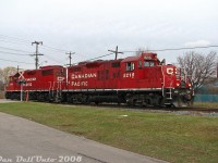 CP on the Owen Sound Sub? Sometimes you just need a bit of luck: I was passing through Streetsville one afternoon and chanced a glance down the CP/OBRY Owen Sound Spur at Mississauga Road crossing - a headlight was visible in the distance! Heading south to the interchange track at Alpha Mills Road for the shot, it turned out it wasn't <a href=http://www.railpictures.ca/?attachment_id=5178><b>OBRY's usual unit</b></a>, but instead the front of a CP GP9u. Quickly lining up the shot, CP <a href=http://www.railpictures.ca/?attachment_id=44006><b>GP9u 8215</b></a> and <a href=http://www.railpictures.ca/?attachment_id=48257><b>GP38-2 3105</b></a> came into view over the grade crossing, working today's Streetsville Turn and coming back from switching the customers at the north end of CP's trackage at Creditview Road. The two units would head down to Streetsville Junction, and proceed to switch the PDI transload facility inside the old wye area west of Mississauga Road. Naturally the weather was somewhat dour and overcast (although the grass was surprisingly green for a January winter).<br><br>I've heard mention one or both of the CP customers now no longer sees rail service. And of course, the OBRY's operations on the line to Orangeville have passed into history a number of years back. Of the two Toronto-assigned Geeps, GP9u 8215 was lucky to avoid the GP20C-ECO trade-in program and was instead sold to Rail Switching Service. GP38-2 3105 was, as last check, still active elsewhere on the CP system.