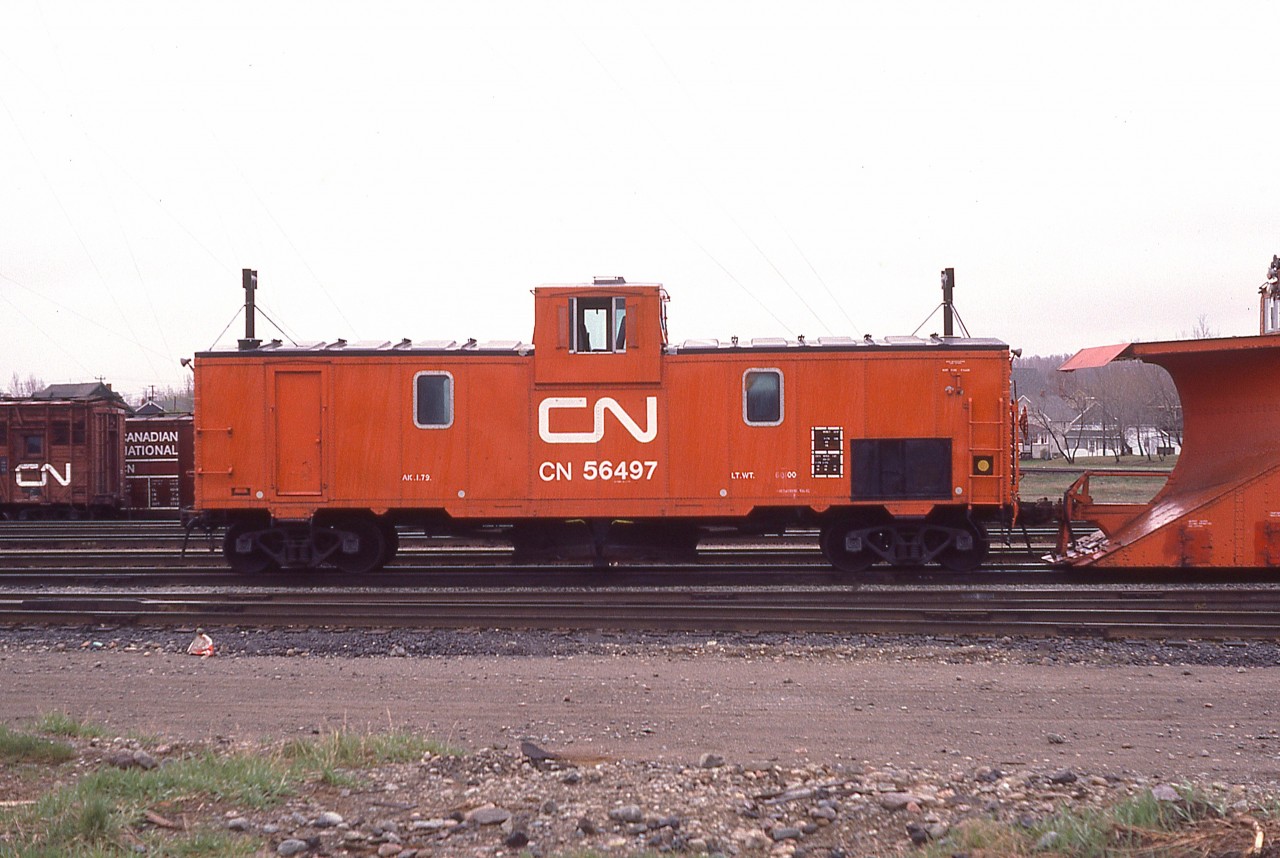 I just do not see any of these any more.  CN Flanger 56497 is shown in the yard at Capreol some years ago. The railroad had a handful of these converted boxcars at one time and I have to assume they are scrapped (Or in museums) This particular one, developed from 40 ft boxcar #481101, I have been unable to find information on since the early 1990s. I'm sure someone out there can present a run-down on the whereabouts of the former 56000 series fleet.  Thank you in advance.!!