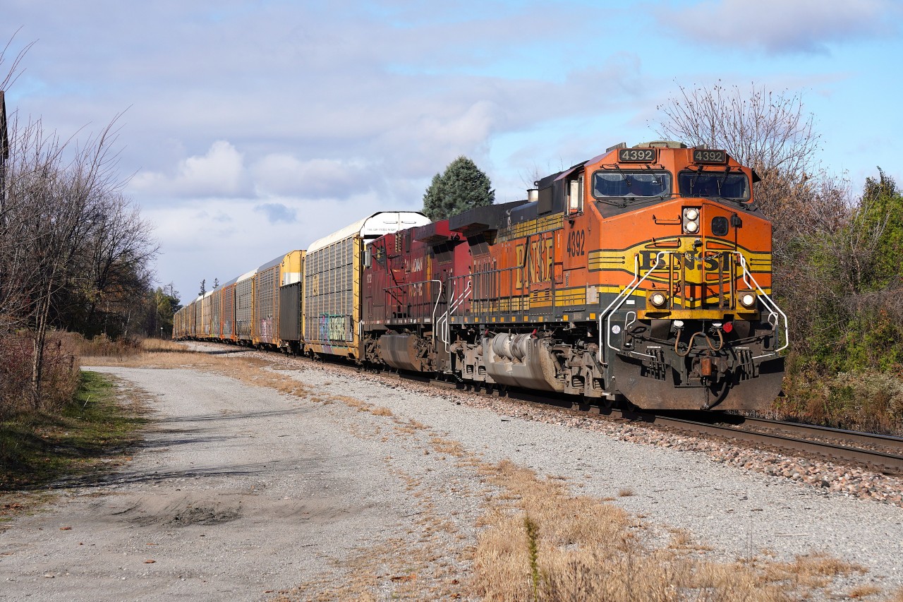 After going in the hole at Bolton for CP 112 to pass, CP H17 continues their way back to Agincourt Yard with foreign leader BNSF 4392 pulling loaded autoracks from Spence.