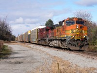 After going in the hole at Bolton for CP 112 to pass, CP H17 continues their way back to Agincourt Yard with foreign leader BNSF 4392 pulling loaded autoracks from Spence.