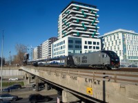 EXO 1401 leads EXO 188 from Saint-Jérôme over the Décarie Expressway during the afternoon rush hour.