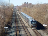 EXO 178 is eastbound on CPKC's Westmount Sub with Charger EXO 1402 leading a CRRC consist.