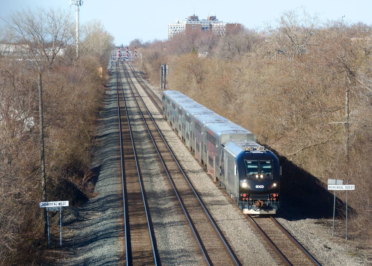EXO 178 is eastbound on CPKC's Westmount Sub with Charger EXO 1402 leading a CRRC consist.