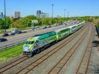 GO 626, donning the new “A PLACE TO GROW” wrap, swings through the curve at Sunnyside on the point of train 1610 from West Harbour.  The eye catching design features various place names served by the GO network.