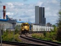 Locomotives 65, PRLX 2270 and 63 switches the alumina hopper cars at the Laterrière aluminium smelter. The Roberval & Saguenay railway services this plant along with the Grande Baie one up to 3 times a day. 