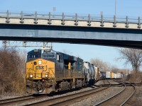 Running out of Montreal overnight during the past year or two, CN 327 (destined for interchange with CSXT closer to the international border and usually running with CSXT power) has gone back to running in the afternoon since a few weeks ago.

Here it is through the s-curve at Dorval with ET44AH CSXT 3391 leading.