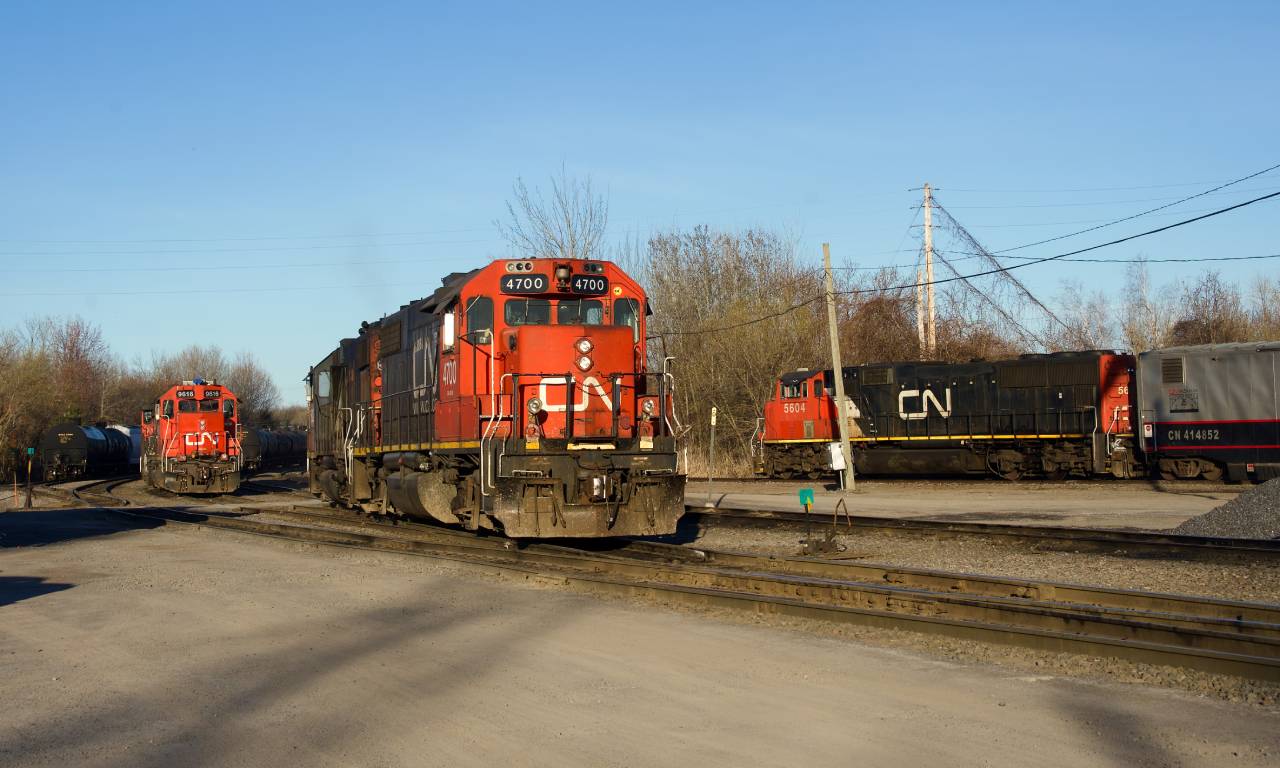 With a second set of local power parked at left and the test train parked at right, CN 536's power begins its shift at Coteau.