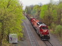 CPKC CWR-06 is returning from Farnham as it passes through Montreal West. Power is CP 5901, CP 5766 & CP 2248.