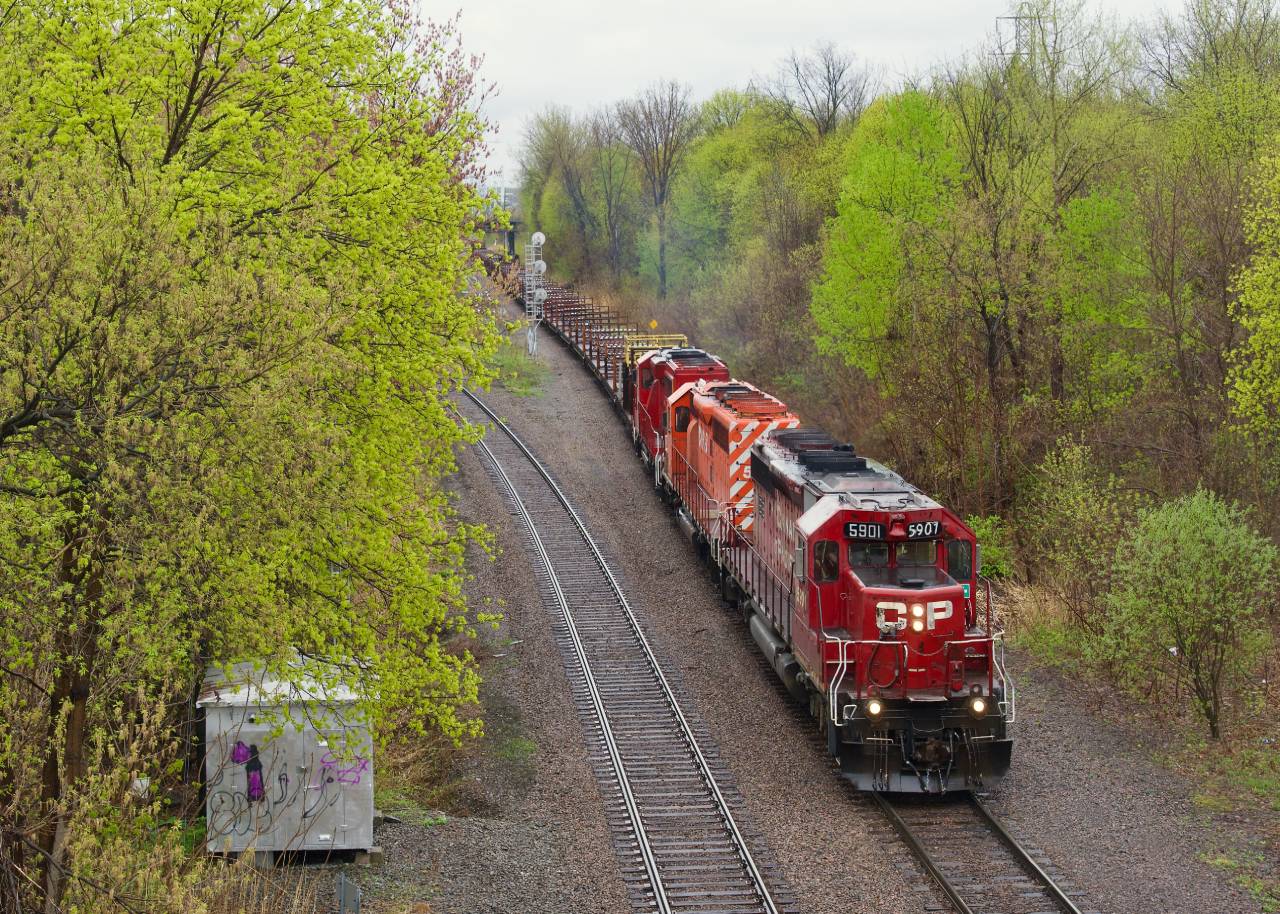 CPKC CWR-06 is returning from Farnham as it passes through Montreal West. Power is CP 5901, CP 5766 & CP 2248.