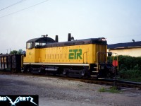 During a hazy summer day, Essex Terminal Railway (ETR) SW1200 105 is seen switching cars in Windsor, Ontario. The unit was built in 1956 and still continues to work today on ETR. In 2021, Sarnia-based Lambton Diesel Specialists (LDS) had completed an extensive rebuild of the unit as well as a full repainting into a heritage green and yellow scheme similar to the one it wore when delivered new. 
